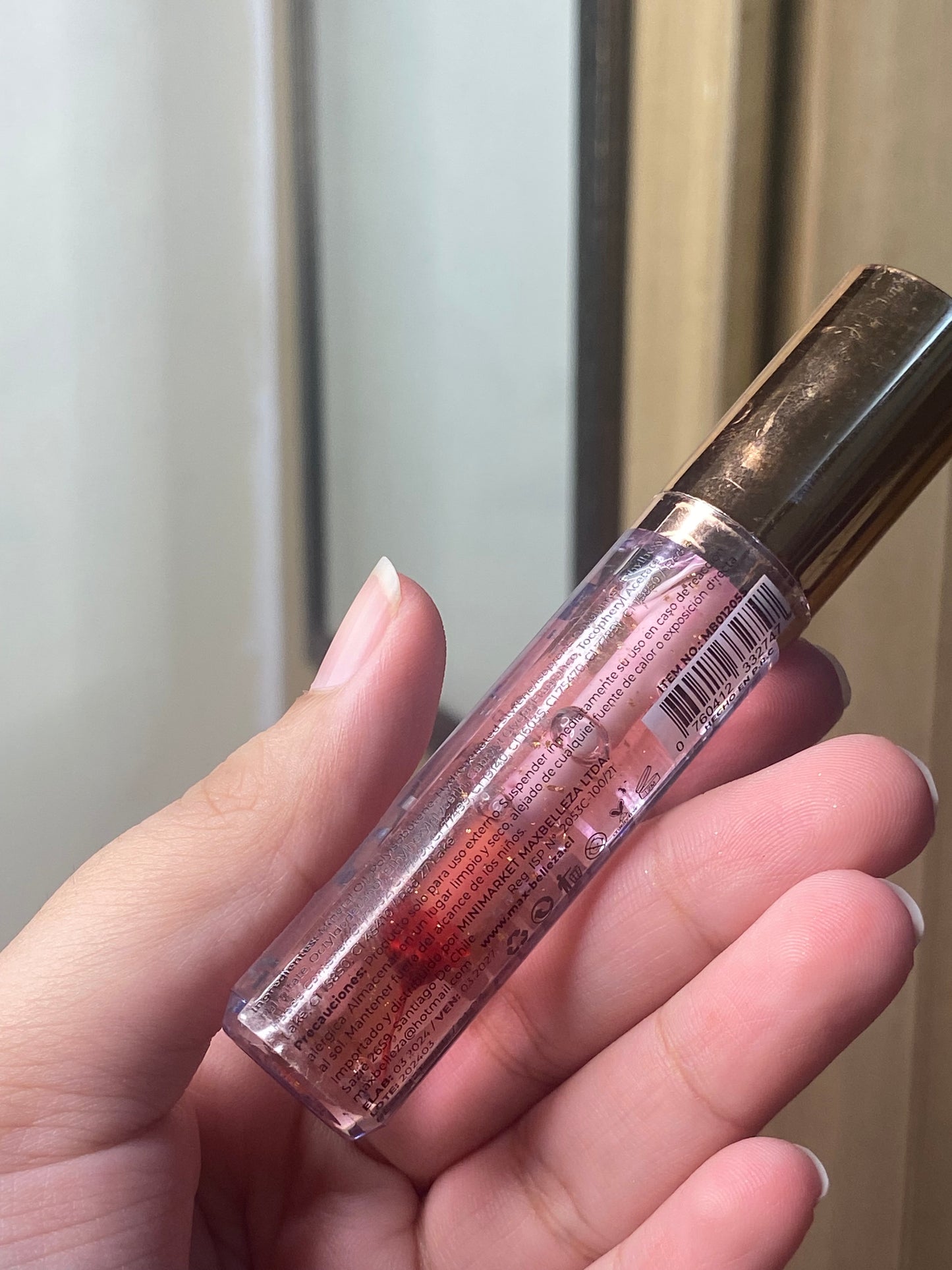 MaxBelle 24K Flores Gloss with flower