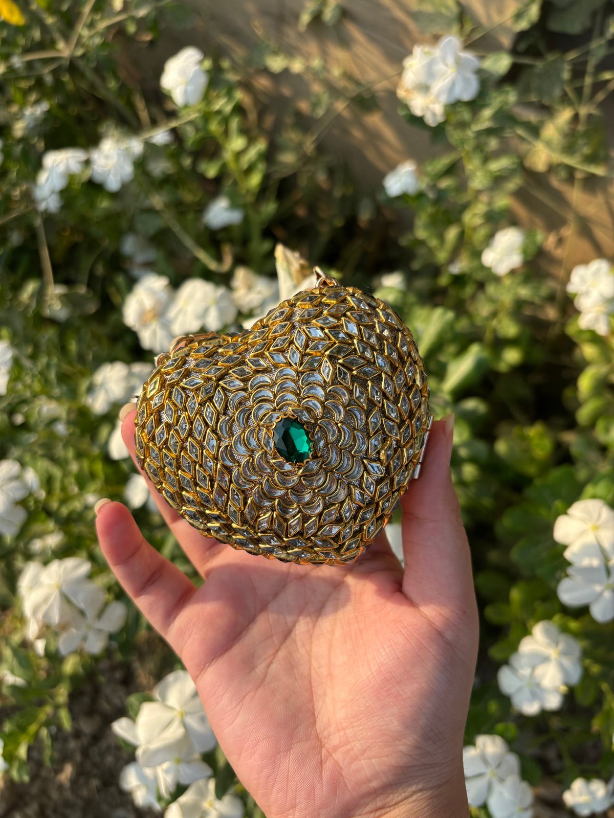 Heart Shaped Kundan Clutch with Green Stone