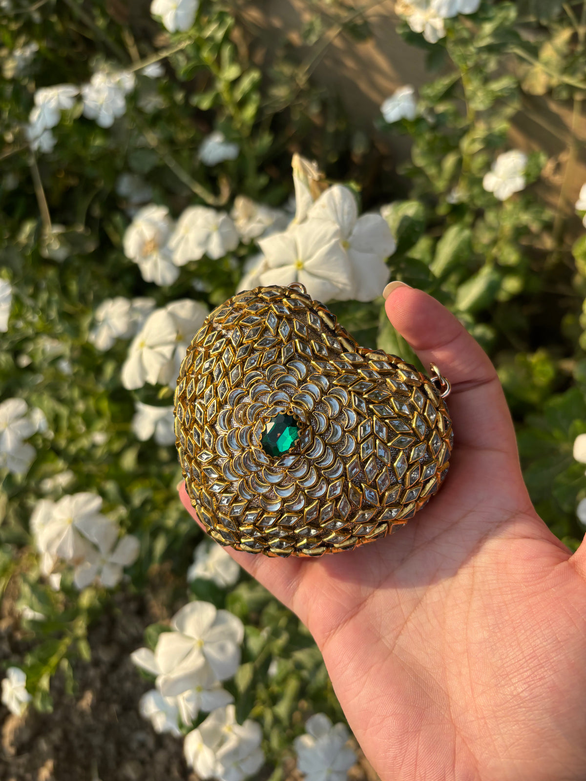 Heart Shaped Kundan Clutch with Green Stone