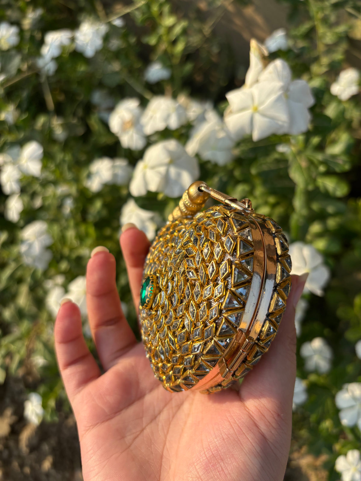 Heart Shaped Kundan Clutch with Green Stone