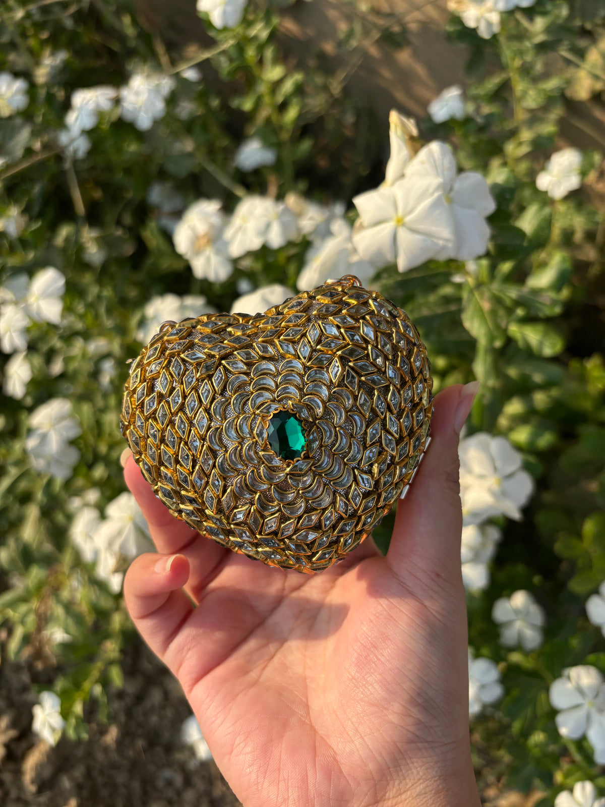 Heart Shaped Kundan Clutch with Green Stone