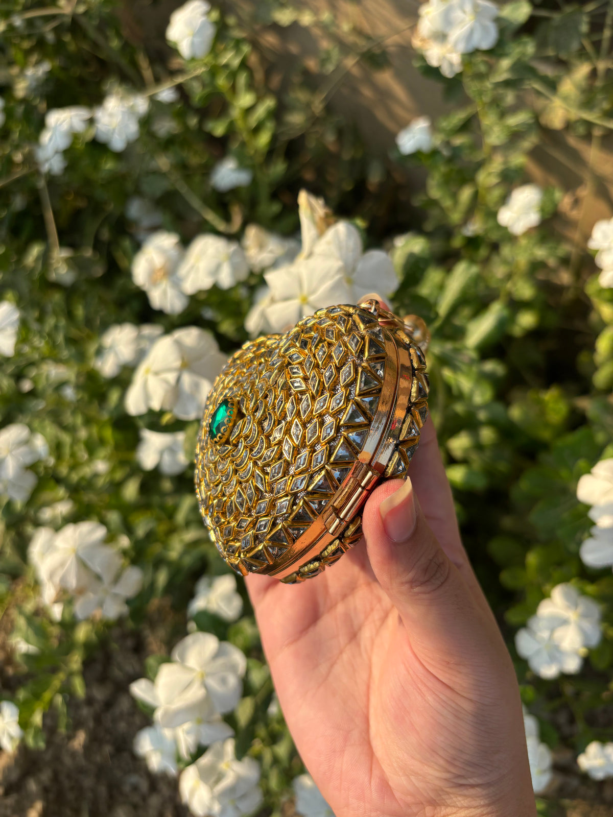 Heart Shaped Kundan Clutch with Green Stone